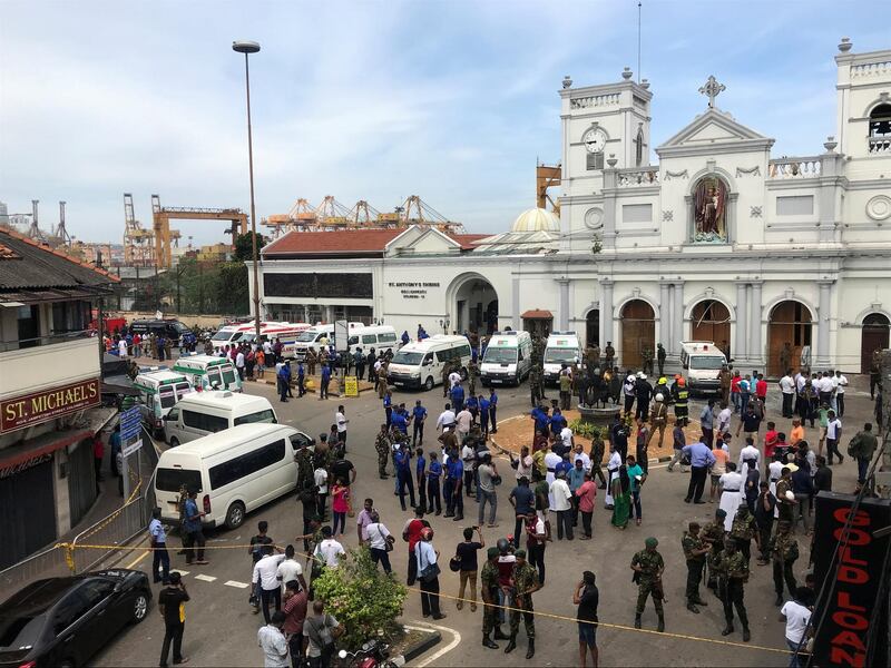 Ambulances are seen outside the church premises after a blast at the St Anthony's Shrine in Kochchikade, Colombo.  Reuters