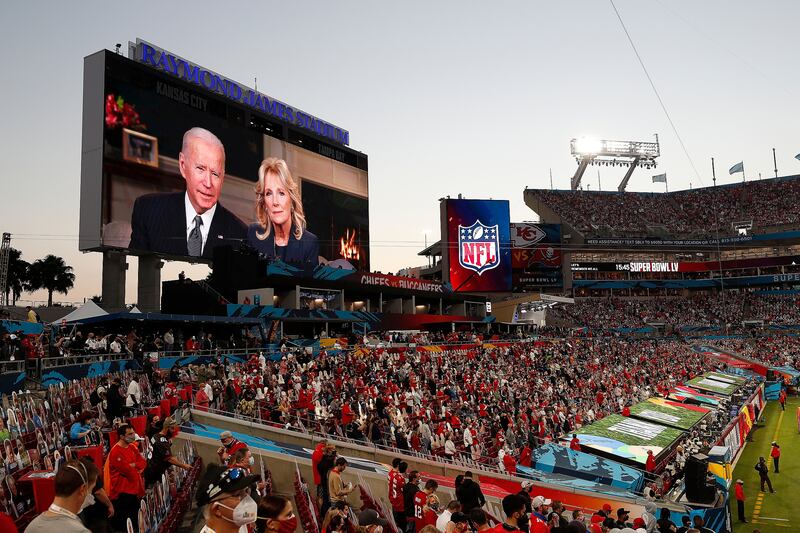 The US president and first lady address the National Football League Super Bowl LV between the Tampa Bay Buccaneers and the Kansas City Chiefs at Raymond James Stadium in Tampa, Florida, on February 7. EPA