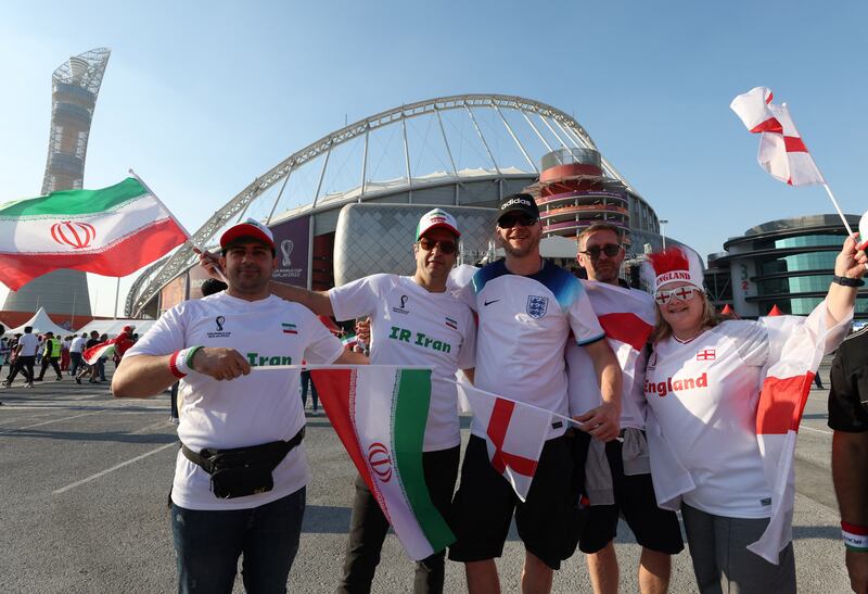 Iran and England fans arrive at Khalifa International Stadium for the match between the two countries. Reuters