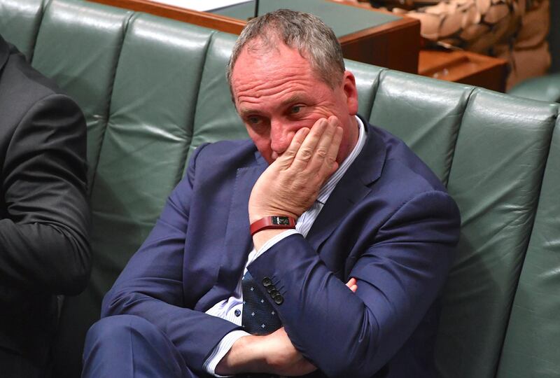 Australian Deputy Prime Minister Barnaby Joyce reacts as he sits in the House of Representatives at Parliament House in Canberra, Australia, October 25, 2017. Picture taken October 25, 2017.  AAP/Mick Tsikas/via REUTERS    ATTENTION EDITORS - THIS IMAGE WAS PROVIDED BY A THIRD PARTY. NO RESALES. NO ARCHIVE. AUSTRALIA OUT. NEW ZEALAND OUT.