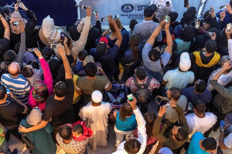 ABU DHABI, UNITED ARAB EMIRATES. 01 DECEMBER 2018. Succesfull World Record attempt for the most Domino���s toppled in a circular form. Shaped in a Year Of Zayed Sheikh Zayed portrait at Marina Mall. (Photo: Antonie Robertson/The National) Journalist: None. Section: National.