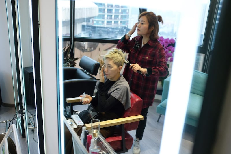 Ma Yinhong during a visit to a salon in Shanghai. AFP