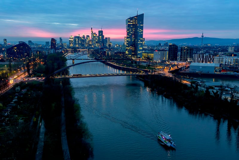 A vessel cruises over the river Main in Frankfurt, Germany. AP