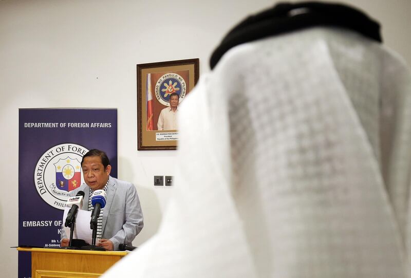 Filippino Ambassador in Kuwait Renato PO Villa speaks during a press conference at the Philippines embassy in Kuwait City on April 21, 2018. / AFP PHOTO / YASSER AL-ZAYYAT