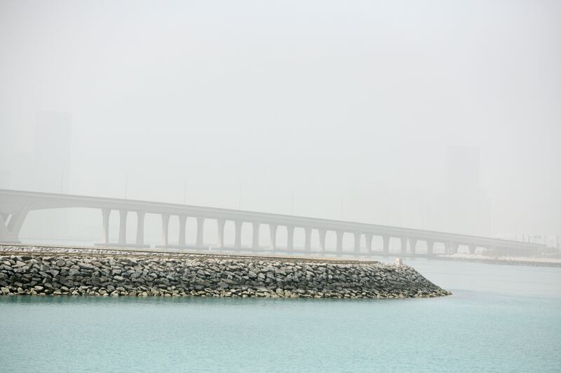 Poor visibility along Sheikh Khalifa Bridge, Abu Dhabi. Khushnum Bhandari / The National
