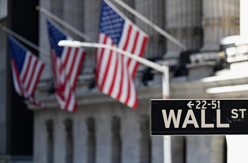 The New York Stock Exchange (NYSE) is pictured on August 3, 2020 at Wall Street in New York City. Stock markets rose on both sides of the Atlantic August 3, 2020 as hopeful economic data prompted bargain hunting, with some of Asia's equities markets also making solid gains. / AFP / Angela Weiss
