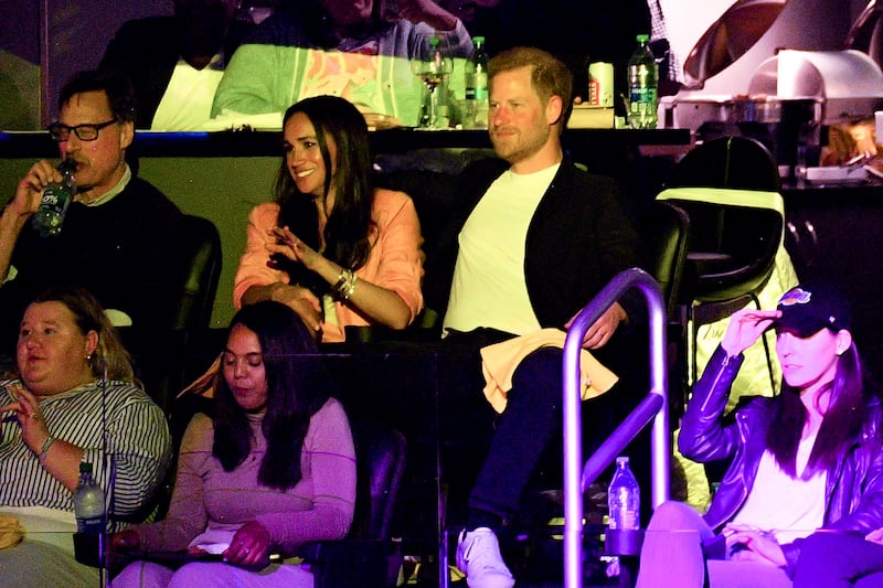 Prince Harry and his wife Meghan attend a basketball game between the Los Angeles Lakers and the Memphis Grizzlies in Los Angeles in April. Getty