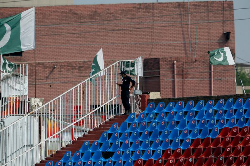 A Pakistani police officer stands guard at the Rawalpindi Cricket Stadium. AP