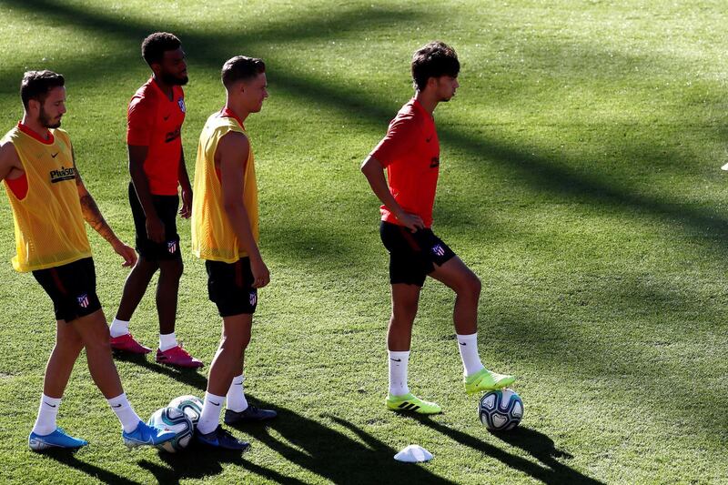 Atletico's players are put through their paces ahead of Saturday's friendly.