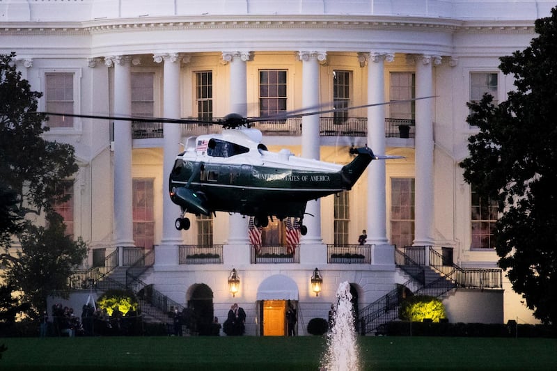 Marine One arrives at the South Lawn of the White House, carrying US President Donald Trump as he returns from Walter Reed hospital, in Washington, DC.  EPA