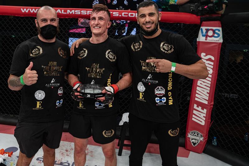 John Mitchell (centre) celebrates after his victory over Arbi Emiev in the UAE Warriors 20 at the Jiu-Jitsu Arena in Abu Dhabi on Saturday, June 19, 2021. Photo: UAE Warriors