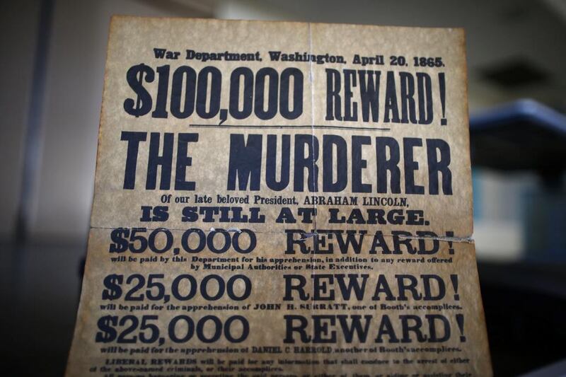 An educational prop showing the reward offered for John Wilkes Booth is seen after Abraham Lincoln presenter and historian John Voehl gave a history lecture to students at Vandenberg Middle School at Vandenberg Air Force Base, California March 27, 2015. Lucy Nicholson / Reuters