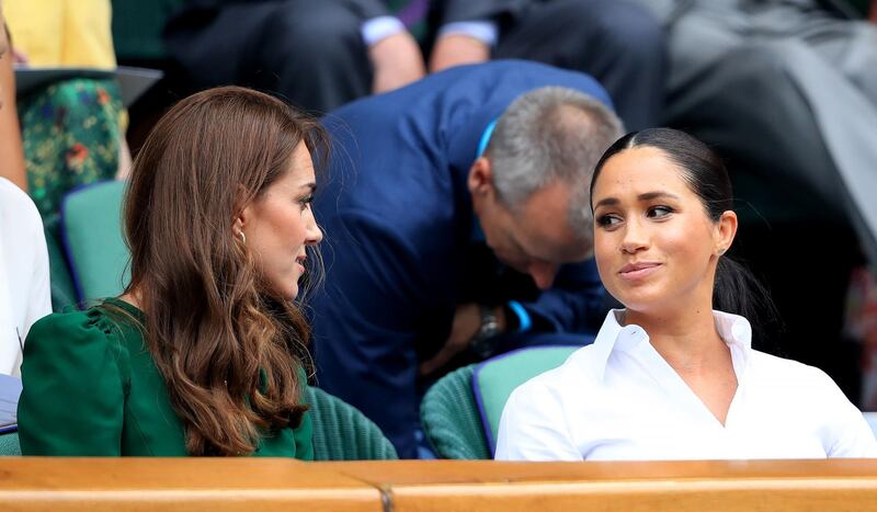 The Duchess of Cambridge and The Duchess of Sussex  on day twelve of the Wimbledon Championships. Photo: PA