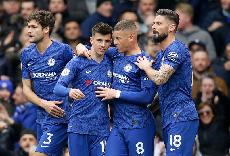 Mason Mount, second left, celebrates scoring Chelsea's first goal in their 4-0 victory against Everton at Stamford Bridge on Sunday. Reuters