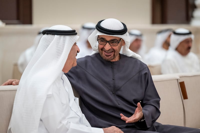President Sheikh Mohamed speaks with Sheikh Saud bin Rashid Al Mualla, Ruler of Umm Al Quwain, at Al Bateen Palace in Abu Dhabi on Friday. Abdulla Al Bedwawi / UAE Presidential Court 