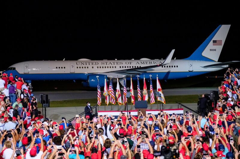 Supporters wait for US President Donald Trump to disembark Air Force One at a campaign rally in Pensacola, Florida, USA. The United States will hold its presidential election on 03 November 2020.  EPA