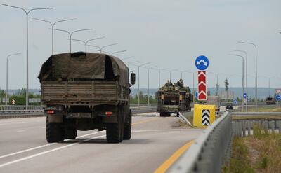 A military column of Wagner private mercenary group drives along M-4 highway, which links the capital Moscow with Russia's southern cities, near Voronezh, Russia. Reuters