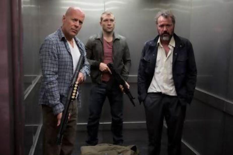 Bruce Willis, left, returns to the big screen as John McClane in A Good Day to Die Hard. Twentieth Century Fox