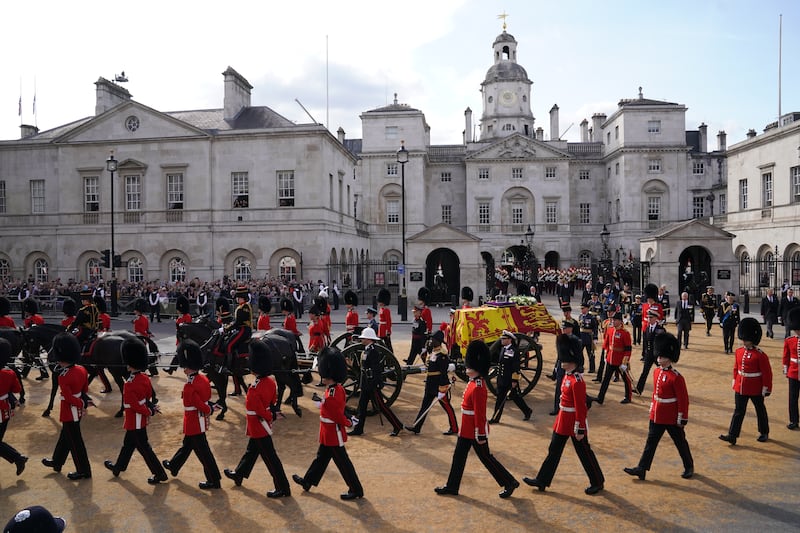 The coffin of Queen Elizabeth is carried on a horse-drawn gun carriage of the King's Troop Royal Horse Artillery. PA