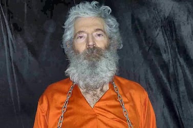 This Image provided by the Federal Bureau of Investigation(FBI) shows a photo of former FBI agent Robert Levinson, who went missing on Kish Island, Iran, on March 9, 2007, shackled and holding a sign. The United States announced a $5 million increased reward March 9, 2015 for information leading to the return of Levinson, as it marked the eighth anniversary of his mysterious disappearance in Iran. The FBI had previously issued a $1 million reward for Levinson's return in 2012, five years after he went missing. AFP PHOTO / HANDOUT / FBI == RESTRICTED TO EDITORIAL USE / MANDATORY CREDIT: "AFP PHOTO / HANDOUT / FBI "/ NO MARKETING / NO ADVERTISING CAMPAIGNS / NO A LA CARTE SALES / DISTRIBUTED AS A SERVICE TO CLIENTS == (Photo by -- / FBI / AFP)