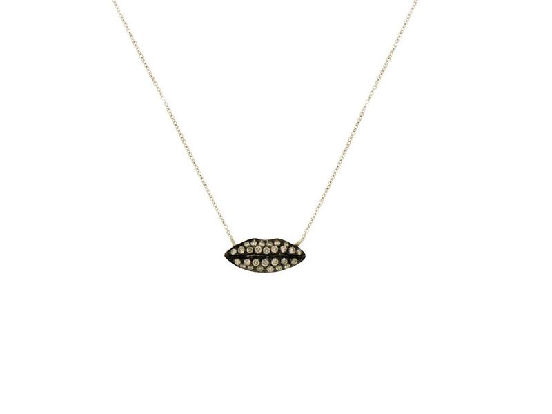 Sparkling diamonds depict a strong contrast against stark, black lips; Dh10,900. Courtesy of Bloomingdale’s Dubai
