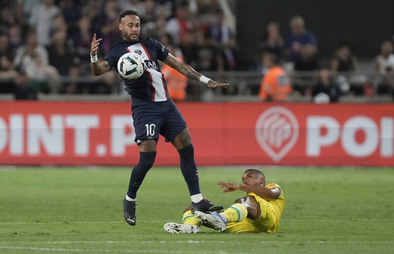 Neymar challenges for the ball with Nantes defender Jean-Charles Castelletto. AP