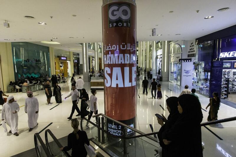 Shoppers packed malls around the country on Friday ahead of Eid Al Fitr. At Dubai Mall posters advertised bargains for the festival that marks the end of Ramadan and the start of Shawaal, the 10th month of the Islamic lunar calendar. Christopher Pike / The National