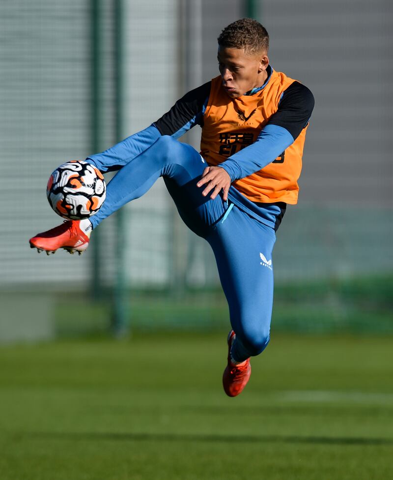 Dwight Gayle controls the ball mid air during the Newcastle United training session.