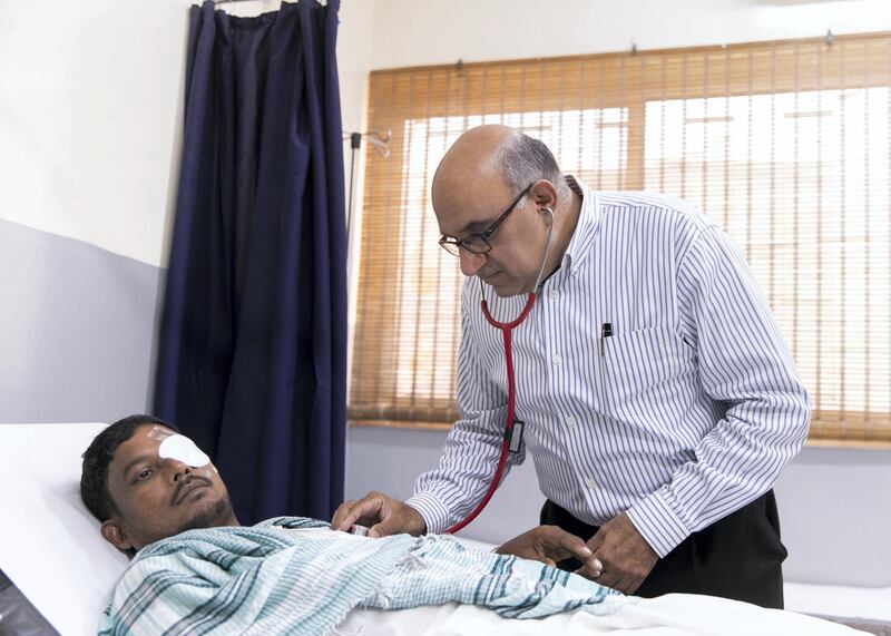 DUBAI, UNITED ARAB EMIRATES. 21 AUGUST 2019. 

Dr Sanjay Paithankar at his clinic, Right Health New Sanaiya Clinic. Dr Sanjay came to the UAE more than 30 years ago. He worked with the health ministry before he began setting up affordable health clinics for garment workers in Ajman in the 1990s. His clinics now treat more than 500,000 and are usually located near workers’ residences. He was among those who have received the gold card visa.

(Photo: Reem Mohammed/The National)

Reporter:
Section: