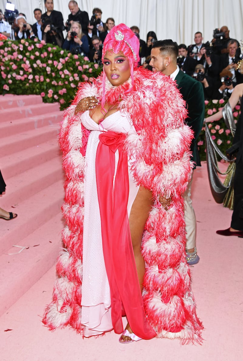 Lizzo in a pink feathered Marc Jacobs dress on May 6, 2019, in New York City. Getty Images