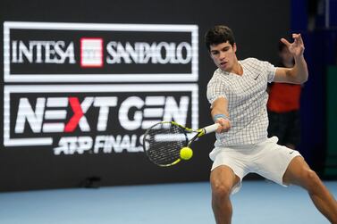 FILE - Spain's Carlos Alcaraz returns the ball to Argentina's Sebastian Baez during the ATP Next Gen semifinal tennis tournament in Milan, Italy, Friday, Nov.  12, 2021.  Saudi Arabia will host the men’s tennis tour’s Next Gen ATP Finals in Jedda through 2027 under an agreement announced Thursday, Aug.  24, 2023, the latest foray into sports by the kingdom.  The end-of-season tournament for the ATP’s leading 21-and-under players will be held this year at the King Abdullah Sports City on an indoor hard court from Nov.  28 to Dec.  2.  (AP Photo / Antonio Calanni, File)