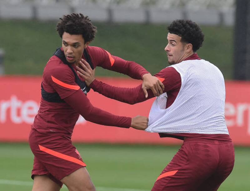 Trent Alexander-Arnold and Curtis Jones during a training session at AXA Training Centre.