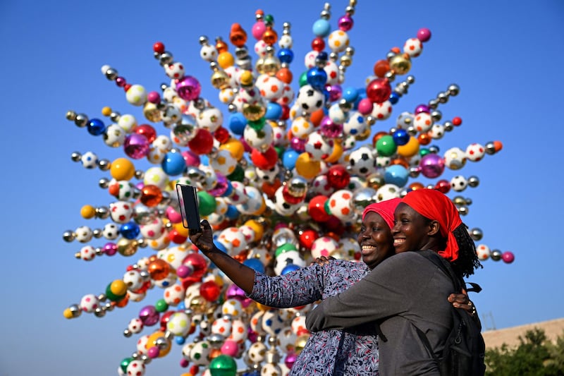 Come Together by South Korean artist Choi Jeong-hwa, at Education City Stadium. The 12-metre-tall sculpture is a tribute to all those who made the Qatar World Cup possible. AFP