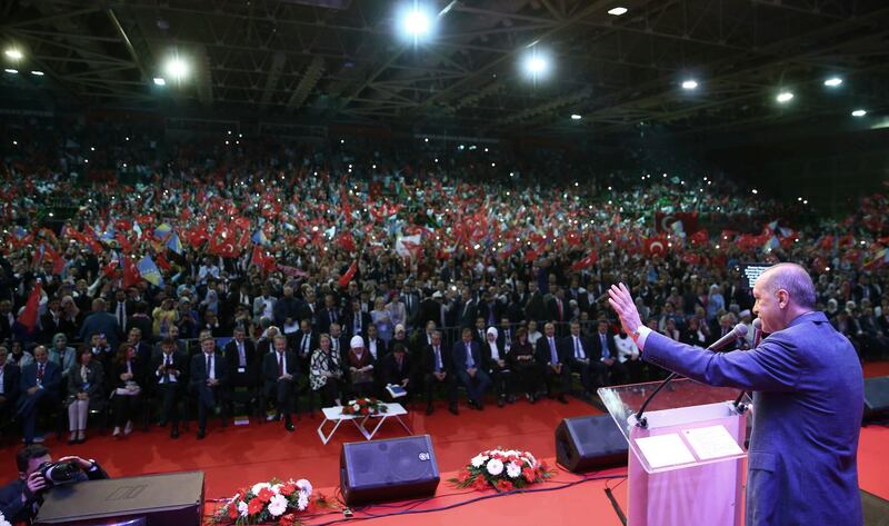 Turkey's president Recep Tayyip Erdogan addresses his supporters in Sarajevo, Bosnia, Sunday, May 20, 2018. Erdogan arrived in the Bosnian capital to address supporters living in Europe, ahead of snap June 24 elections in his country (Presidential Press Service/Pool via AP)