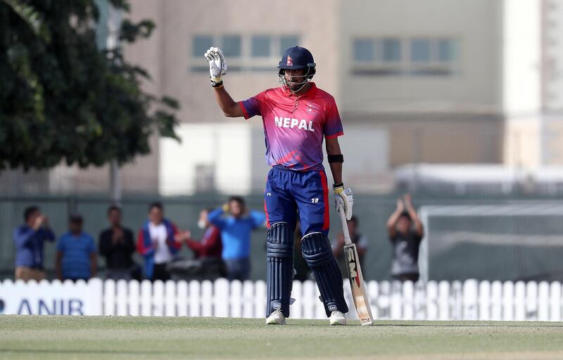 DUBAI , UNITED ARAB EMIRATES , January 28 – 2019 :- Paras Khadka of Nepal celebrating after scoring his century during the one day international cricket match between UAE vs Nepal held at ICC cricket academy in Dubai. Nepal won the match by 4 wickets. Paras scored 115 runs in this match. ( Pawan Singh / The National ) For Sports. Story by Paul