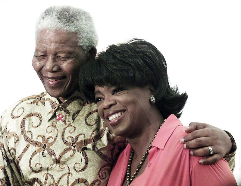 It wasn’t just world leaders who adored Mandela. Here Madiba poses with Oprah Winfrey in Henley, Johannesburg. Juda Ngwenya / Reuters