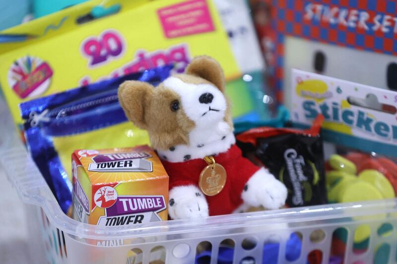 A toy Corgi, which was given to Camilla, Duchess of Cornwall, is seen during her visit to Wightman Road Mosque in north London. AFP