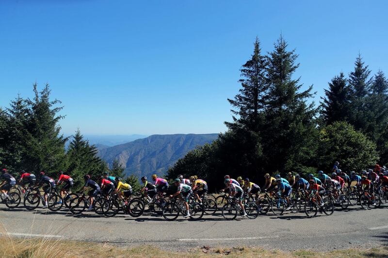 Adam Yates, wearing the overall leader's yellow jersey, during Stage 6. PA