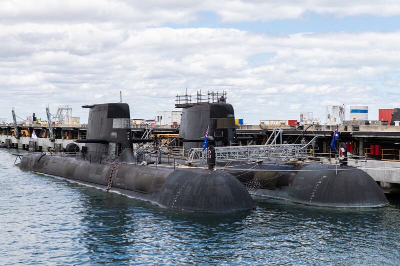 A view of two Australian Collins class submarines at HMAS Stirling Royal Australian Navy base in Perth. In September 2021, Australia, the UK and the US announced an enhanced trilateral security partnership called Aukus, under which Australia will acquire a number of nuclear-powered submarines. EPA