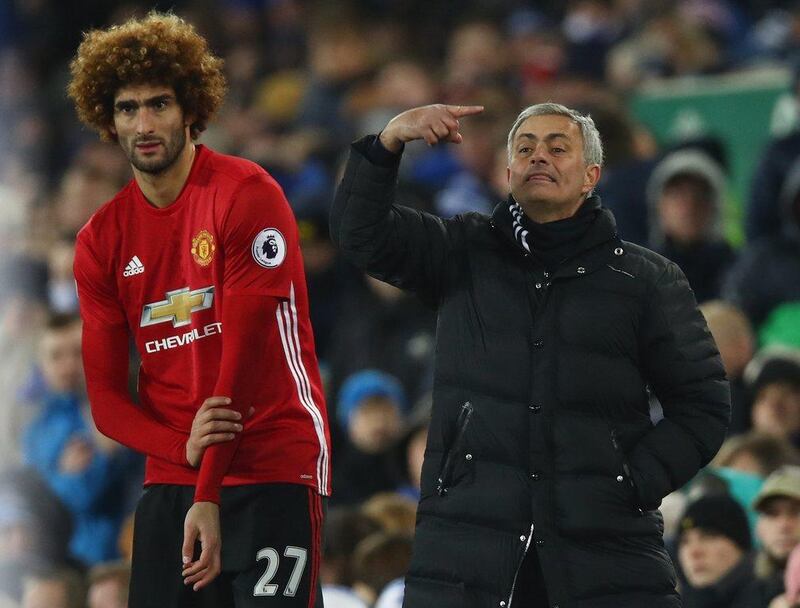 Marouane Fellaini and then Manchester United manager Jose Mourinho. Getty Images