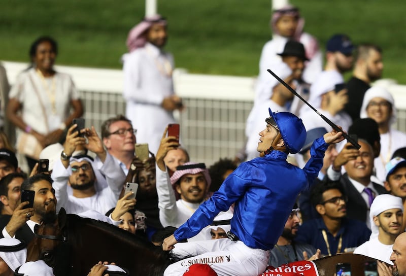 Christophe Soumillon celebrates after winning the Dubai World Cup with Thunder Snow. EPA