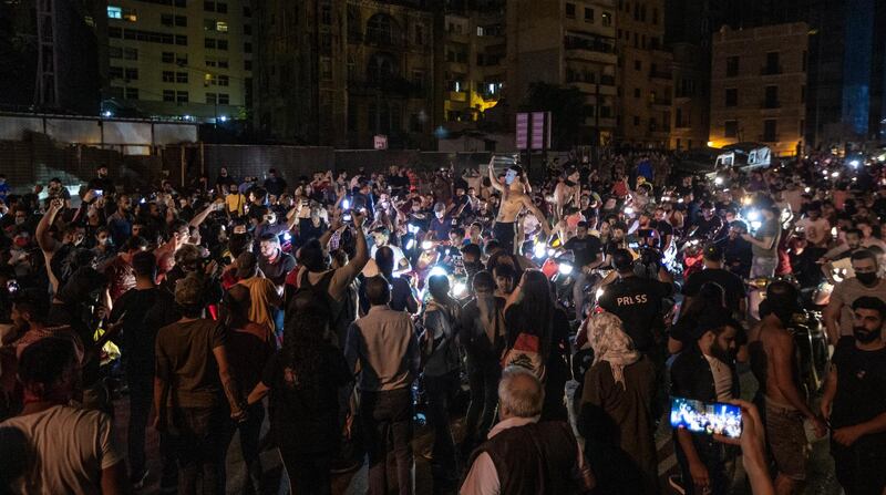 Protesters gather and close roads in Beirut.  EPA