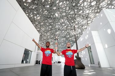 The Special Olympic torch arrived at the Louvre Abu Dhabi on Wednesday. Chris Whiteoak / The National