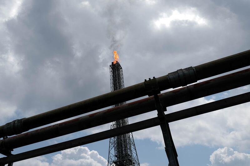 A tower flaring gas at an LNG processing plant operated by Shell in Nigeria. The firm is considering an LNG hub network as vehicles use of the fuel grows. Paul Carsten : Reuters