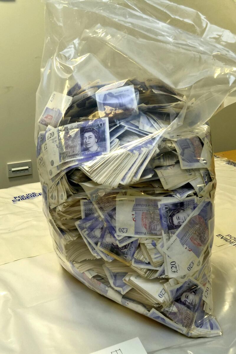 One of the bags of cash that money launderer Sathar Khan ,35, stuffed into 4 suitcases as he tried to fly to Dubai from Stansted Airport on August 29 2018. See National News story NNcash. A passenger was busted with £1.5million of dirty cash crammed into his luggage at an airport last year. Sathar Khan, 35, was stopped as he tried to fly to Dubai with the ill-gotten gains concealed in four suitcases.He was was jailed for three years and nine months after admitting two counts of money laundering in September - and now a judge has agreed he will never get the money back. The forfeiture order was signed off by Canterbury Magistrates' Court this week after an investigation by the National Crime Agency. 

