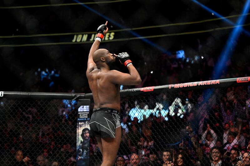 Jon Jones celebrates to the crowd after his victory over Ciryl Gane at UFC 285. AP