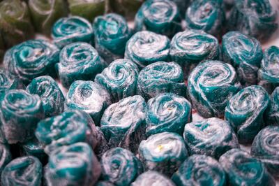 An array of blue sweets for sale in Pasha Castle. Joshua Longmore / The National