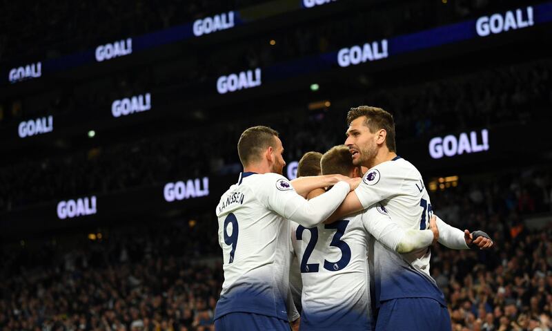 Tottenham's Christian Eriksen celebrates scoring with teammates as his goal secured a 1-0 win over Brighton. Reuters