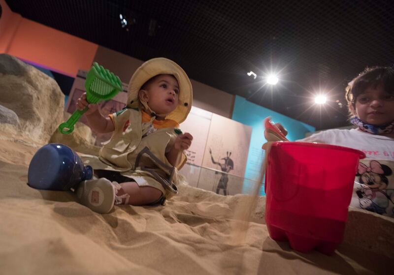 Children use mock-up excavation tools and are introduced to techniques used by archaeologists.