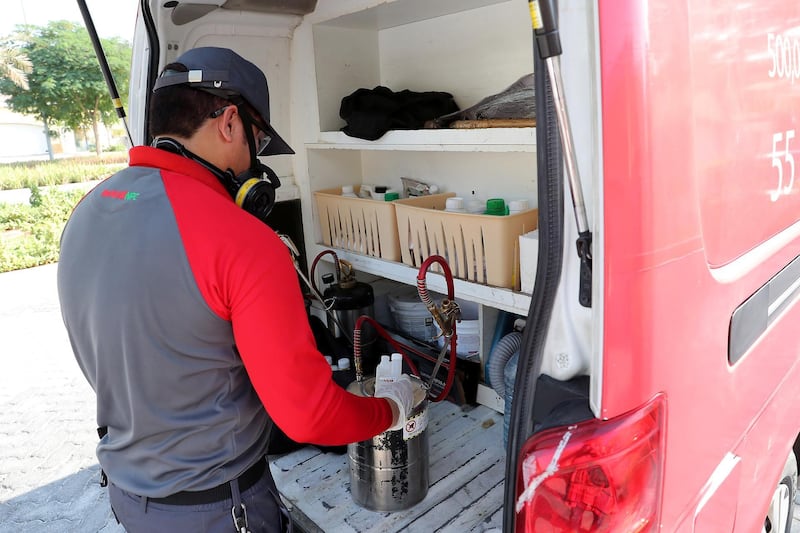 DUBAI, UNITED ARAB EMIRATES , November 10 – 2020 :- John Well, Technician with Rentokil Pest Control company mixing the chemical spray for the pest control treatment for crazy ants at the villa in Jumeirah Park in Dubai. (Pawan Singh / The National) For News/Online. Story by Kelly 